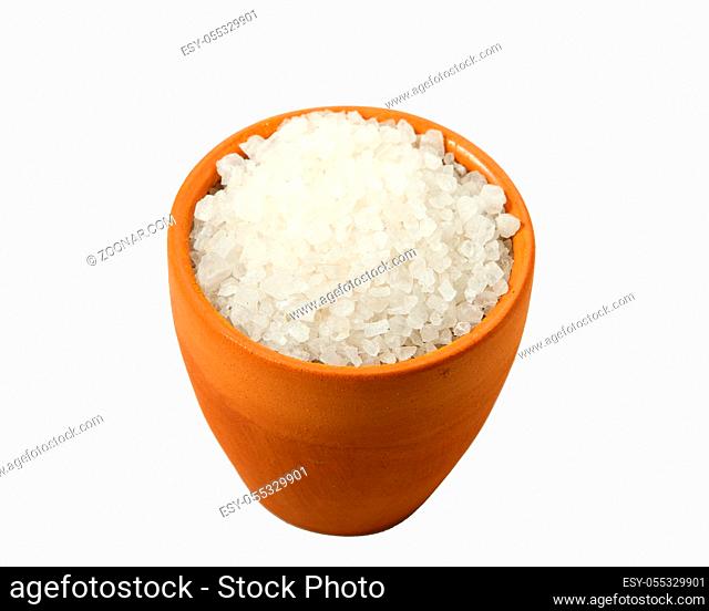 Coarse salt in a bowl isolated on a white background. View from above