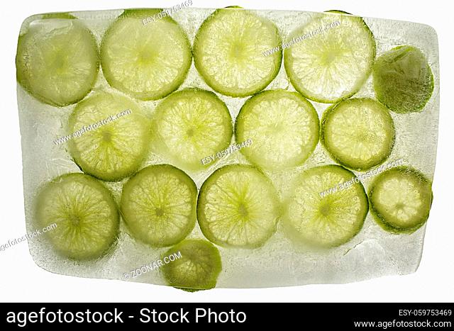 Ice Block with Slices of frozen Lime Fruit
