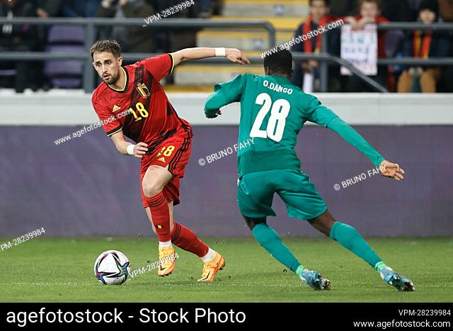 Belgium's Adnan Januzaj and Burkina Faso's Dango Ouattara fight for the ball during a friendly soccer match between Belgian national team the Red Devils and...