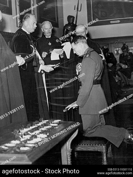 The Duke of Gloucer gives the Accolade of the order of St. John to the kneeling Viscount ***** in the order's chapter Hall in their ***** London today