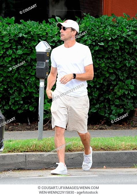 """Mad Men"" star Jon Hamm gets his eyes checked at the optometrist and dropping off dry cleaning in Los Angeles after snagging an Emmy Award for best lead...