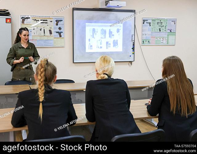 RUSSIA, GUDERMES - FEBRUARY 27, 2023: A female instructor and students are seen in a classroom during a session of the ""Female Bodyguard"" close protection...