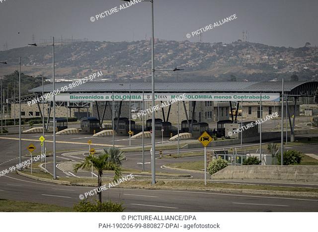 06 February 2019, Venezuela, Cucuta: ""Welcome to Colombia. More Colombia, less smuggling"" is the motto at the border crossing between Colombia and Venezuela...