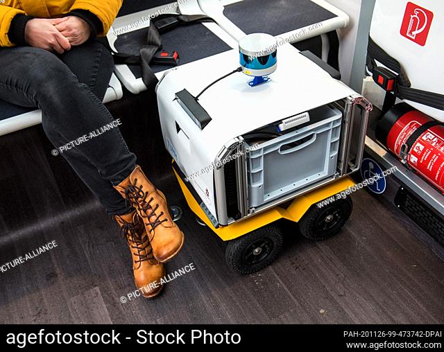 26 November 2020, Schleswig-Holstein, Lauenburg/Elbe: A prototype of a transport robot stands in an autonomously driving bus during a press meeting