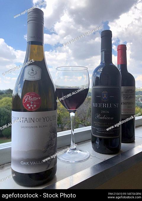 08 April 2021, South Africa, Johannesburg: Wine bottles with fancy names, including ""Fountain of Youth"", ""Nymphomaniac"" or ""Meerlust""