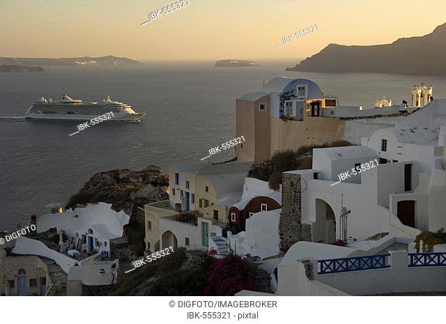 Cruise liner and Aspaki Hotel, Oia, Santorini, Cyclades, Aegean Sea, Greece