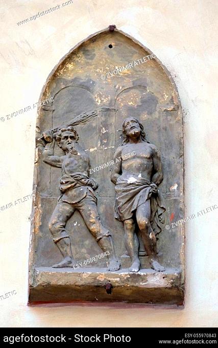 Flagellation of Christ, bass relief in Basilica of Saint Sylvester the First (San Silvestro in Capite) in Rome, Italy