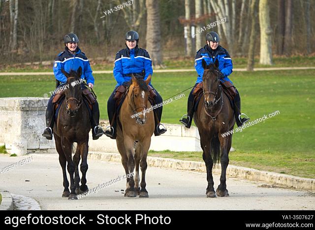 France, Loir-et-Cher (41), Chambord (Unesco World Heritage), royal castle from Renaissance period, three riders gendarmes of National guard from horse station...