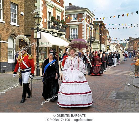 England, Kent, Rochester. People parading through Rochester in Victorian costumes at the Dickens Festival 2010