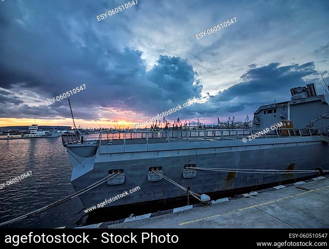 Part of frigate type La Fayette naval forces of NATO at sunset at the port. Warship