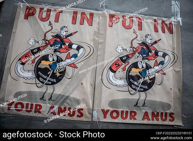 Poster hanging all over the city ""Put in your Anus"", mocking Russian President Vladimir Putin, in Dnipro, Ukraine, during the Russian invasion