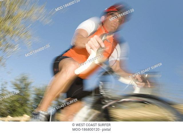 Male cyclist blurred motion