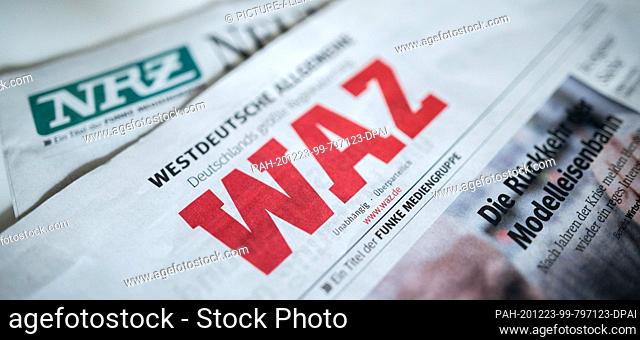 23 December 2020, North Rhine-Westphalia, Oberhausen: ILLUSTRATION - Today's editions of the newspapers ""WAZ"" and ""NRZ"" of the Funke Media Group are on a...