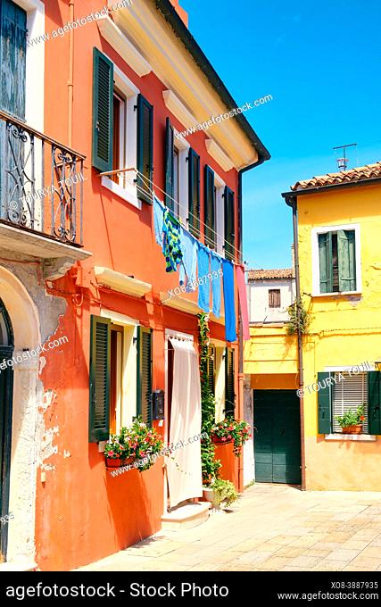 Traditional brightly painted houses on the italian island of Burano near Venice