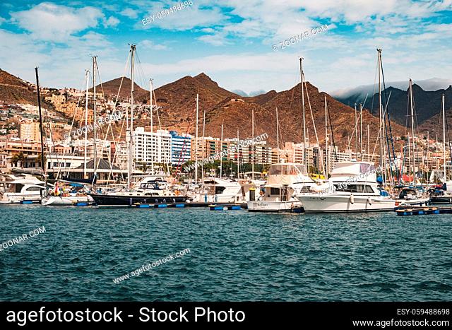 Tenerife, Spain - August, 2019: Sailing boats, motorboats and yachts at Santa Cruz Marina Harbour in Tenerife