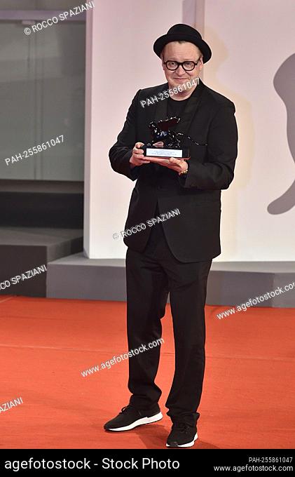 VENICE, ITALY - SEPTEMBER 11: Teemu Nikki poses with the Audience Award Armany Beauty for ""The Blind Man Who Did Not Want To See Titanic"" at the awards winner...