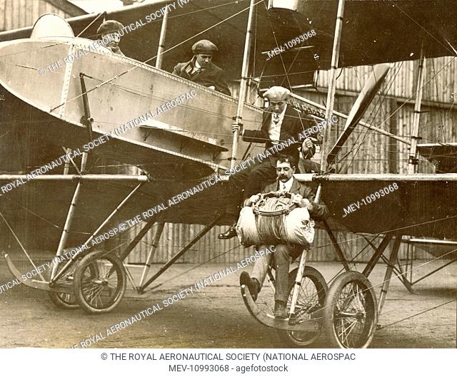 Mr W. Newell preparing for a parachute descent from the Grahame-White Type 10 Charabanc or Aero-bus on 9 May 1914. At 5, 000ft Mr Newell jumped from the skid