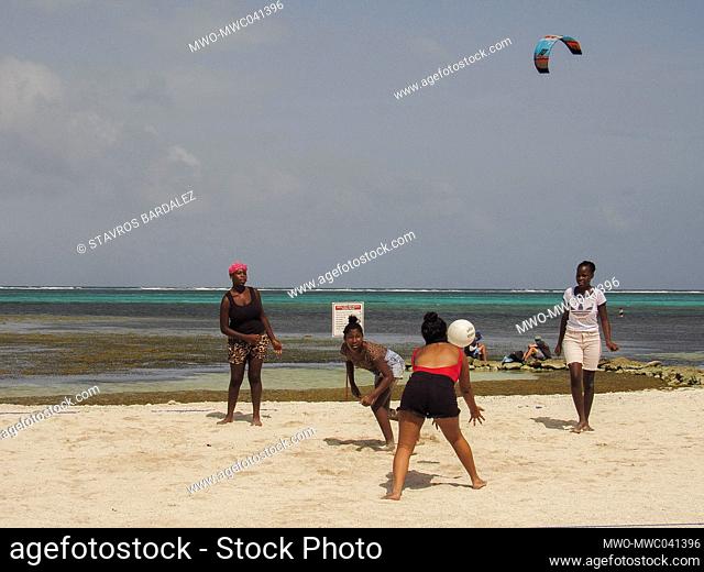A friendly game of volleyball along the beach of Ambergris Caye, Belize