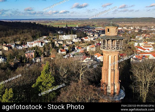 03 January 2023, Brandenburg, Bad Freienwalde: On Galgenberg, high above Bad Freienwalde, there is an observation tower (aerial view with a drone)