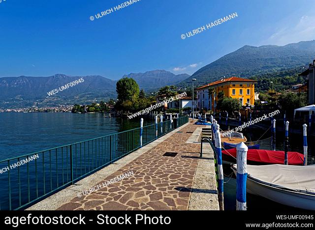 Italy, Lombardy, Sulzano, Boats moored on lake¶ÿIseo
