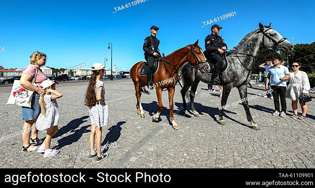 RUSSIA, ST PETERSBURG - AUGUST 15, 2023: Mounted police officers of the Russian Interior Ministry's patrol-guard service are seen in Senate Square