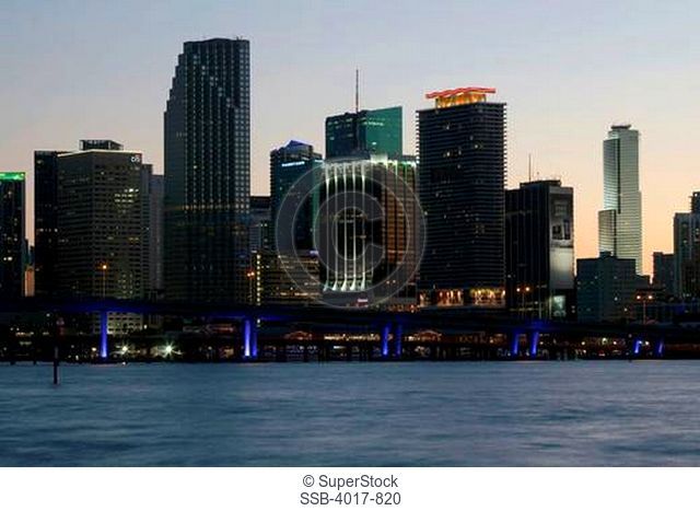 Downtown Miami Skyline and Port Boulevard bridge from across the Intracoastal Waterway at dusk
