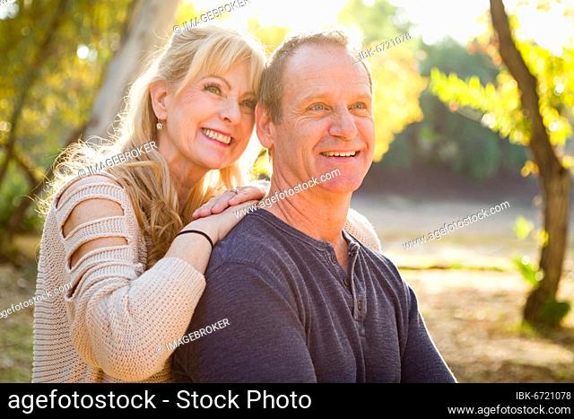Happy middle aged caucasian couple portrait outdoors