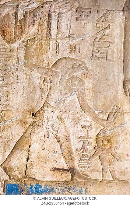 UNESCO World Heritage, Thebes in Egypt, Karnak site, ptolemaic temple of Opet. rare depiction of the hawk-headed god Horus smiting the god Seth
