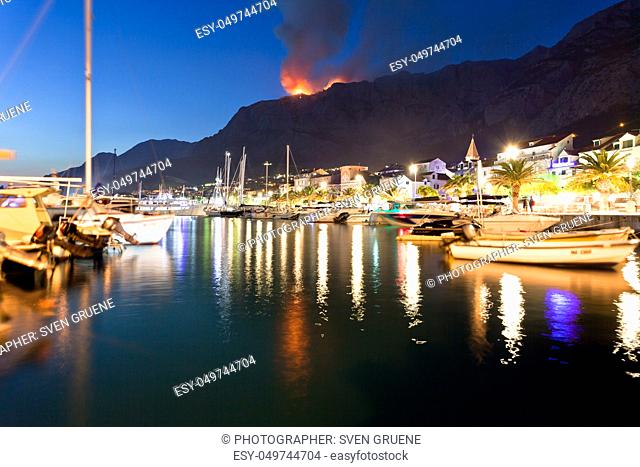 Makarska, Dalmatia, Croatia, Europe - A wildfire in the mountains of Makarska at night