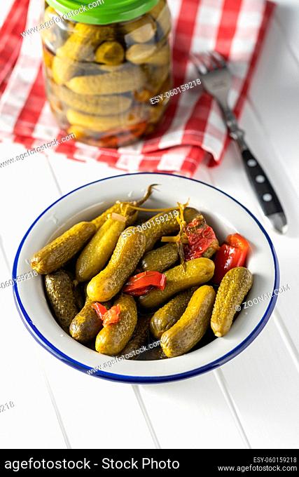 Marinated pickles. Canned cucumbers in bowl