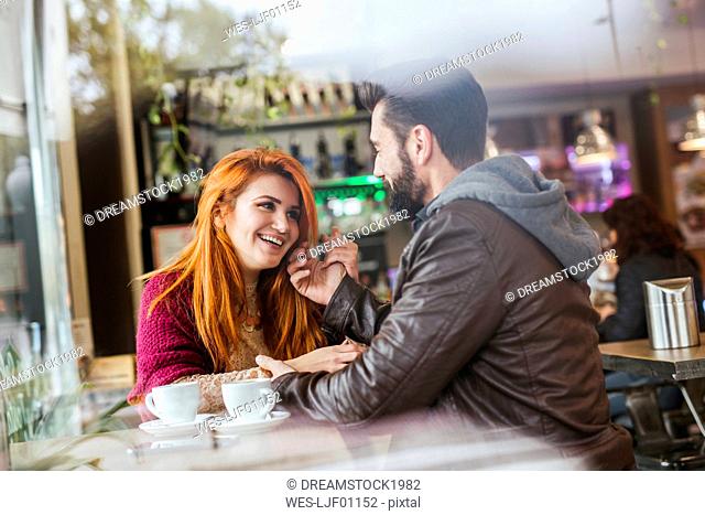 Couple in love in a coffee shop