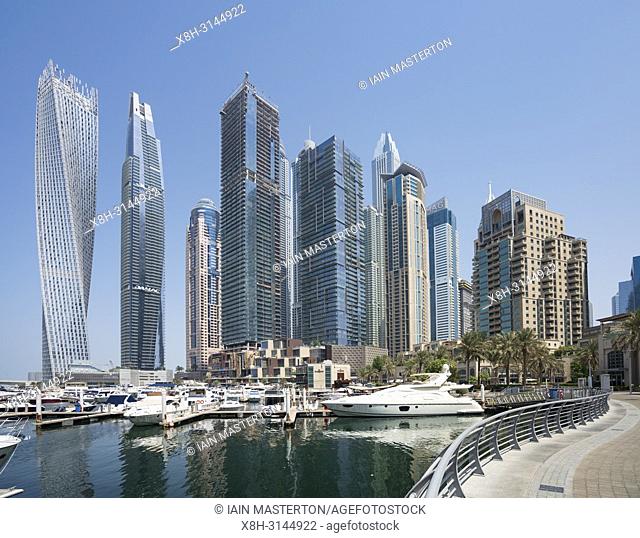 Many high rise apartment towers and skyscrapers in Marina district of Dubai, UAE, United Arab Emirates