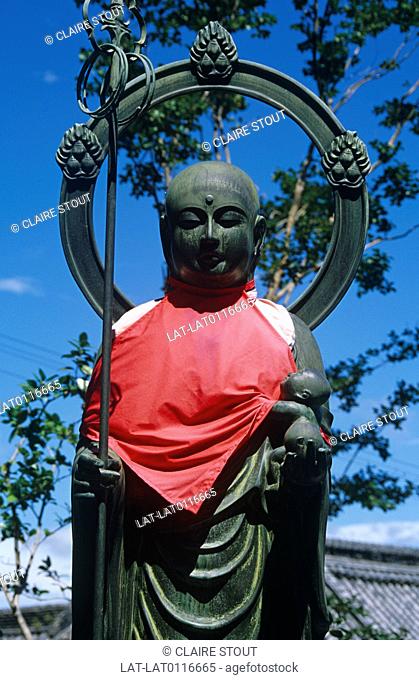 Jizo was originally a Bosatsu or Bodhisattva of Buddhism who stood between the world of reality and the world of the dead