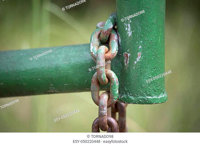 Chain hanging off of property gate