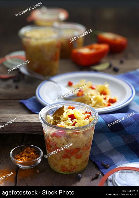 Preserved pointed cabbage with peppers in preserving jars