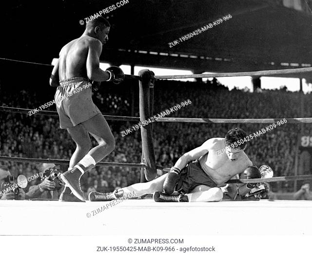 April 25, 1955 - Paris, France - American featherweight boxer PERCY BASSETT beats Frenchman in open air fight in Paris. (Credit Image: © Keystone Press...