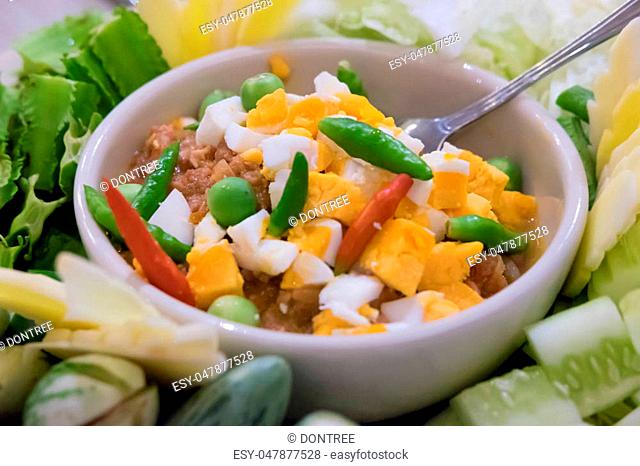Naam Prik Long Rau, chilli dip with pork and egg yolk, Thai cuisine
