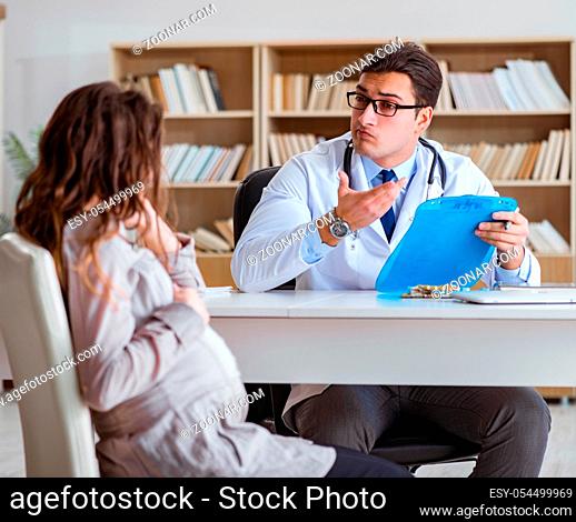 The pregnant woman visiting doctor for consultation