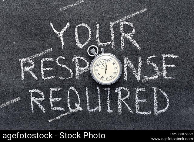 your response required phrase handwritten on chalkboard with vintage precise stopwatch used instead of O