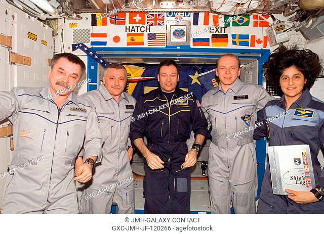 The crewmembers onboard the International Space Station pose for a group portrait during the ceremony of Changing-of-Command from Expedition 14 to Expedition 15...