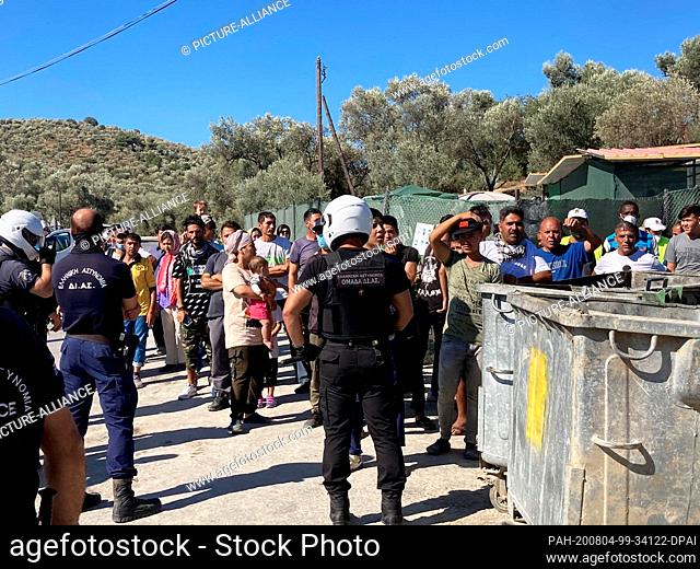 04 August 2020, Greece, Moria: During a visit of North Rhine-Westphalia's Prime Minister Laschet to the Moria refugee camp