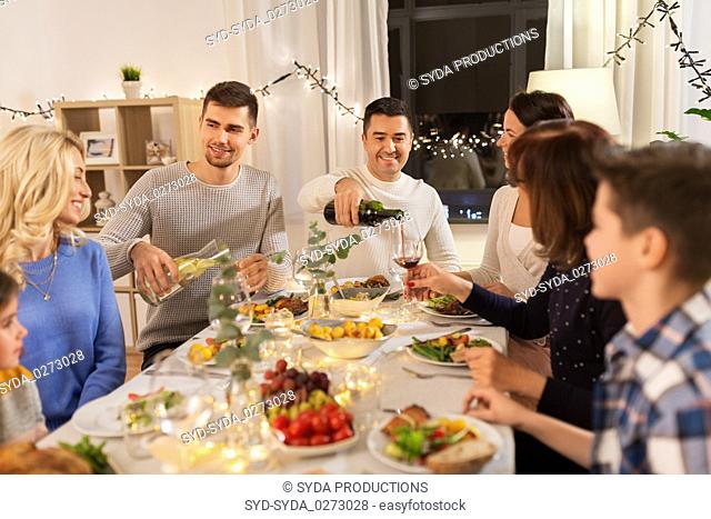 happy family having dinner party at home