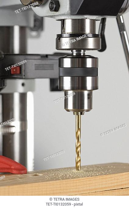 Drill press and wood
