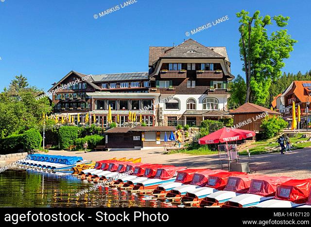 pedal boats on the promenade at titisee, black forest, baden-württemberg, germany