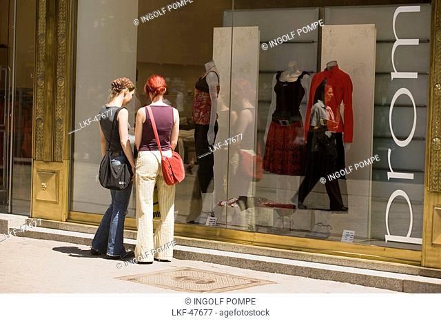 Women in front of a boutique shop window, Women in front of a boutique shop window at Vaci Street, Pest, Budapest Hungary