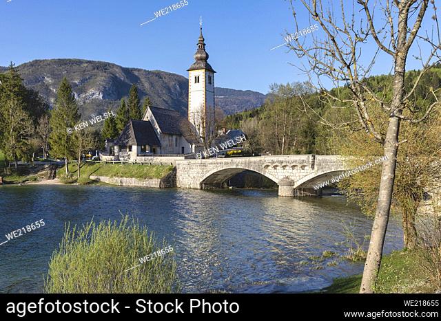 The Romanesque-Gothic church of St. John the Baptist built circa 1100 on the shores of Lake Bohinj outside Ribcev Laz, Upper Carniola, Slovenia