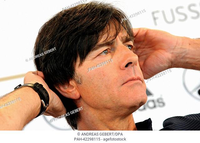 Head coach of the German national soccer team Joachim Loew gesturee during a press conference of the German team in Munich, Germany, 04 September 2013