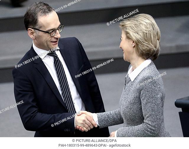 15 March 2018, Germany, Berlin: Heiko Maas (SPD), Foreign Minister, and Ursula von der Leyen (CDU), Defence Minister, greeting each other in the Bundestag...