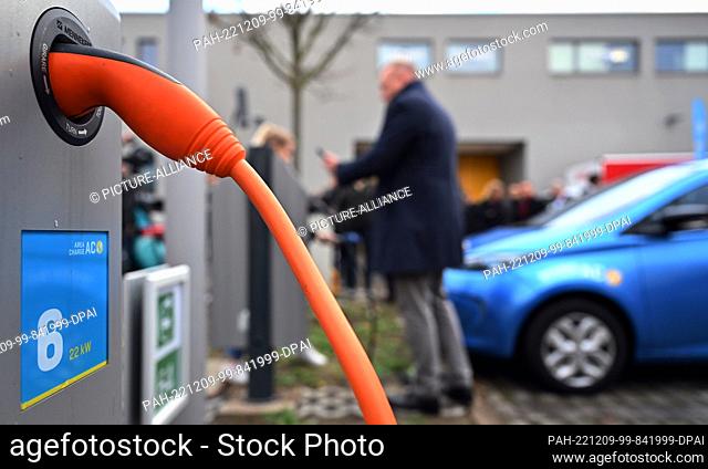 09 December 2022, Thuringia, Erfurt: An electric vehicle is charged in the charging park at the KinderMedienZentrum Erfurt