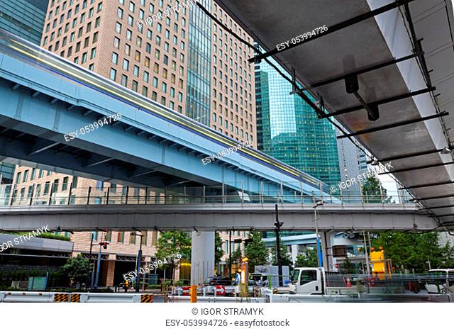Modern architecture. Day view on modern Elevated Highways and steel and glass skyscrapers. Minato City, Tokyo